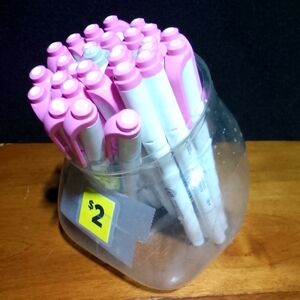 Pink and White Pens in Jar